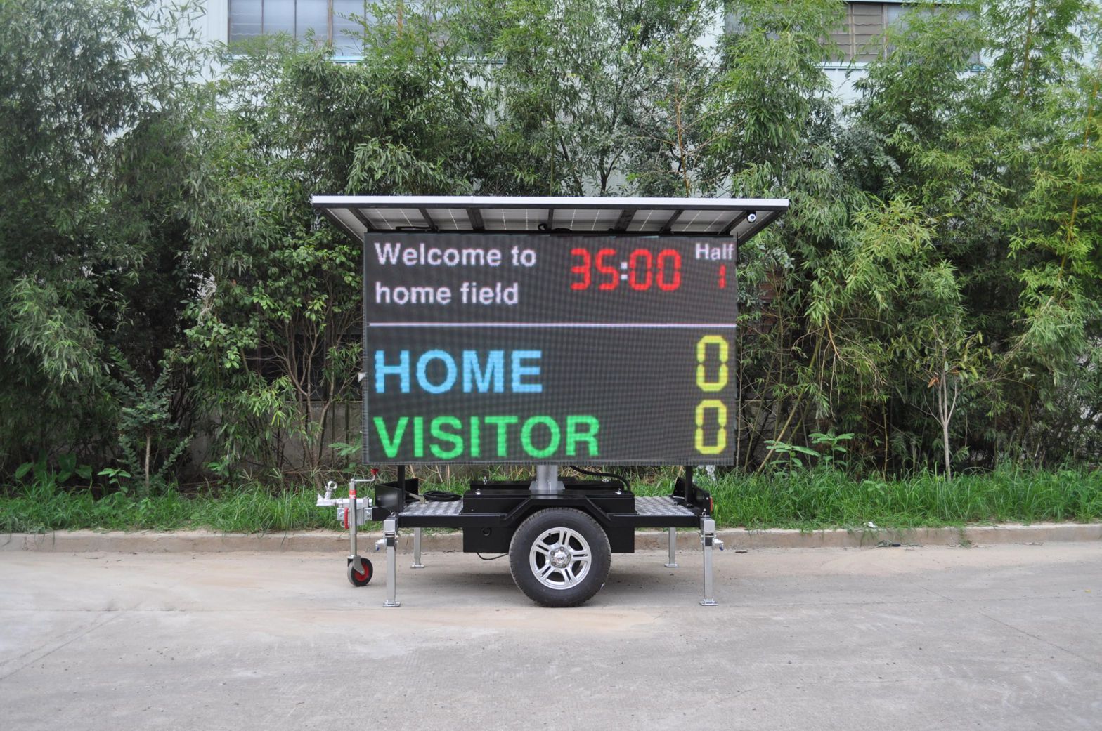 Trailer-mounted LED multisport scoreboard at a sports ground